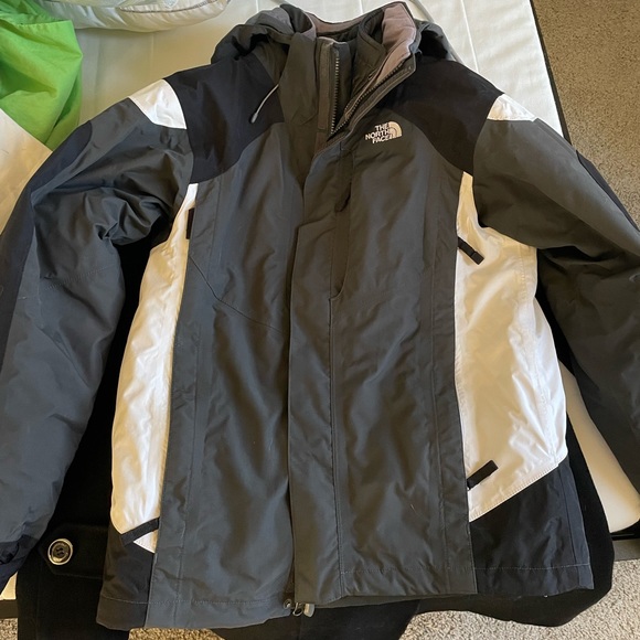 3 in 1 Northface waterproof coat, black white and grey.